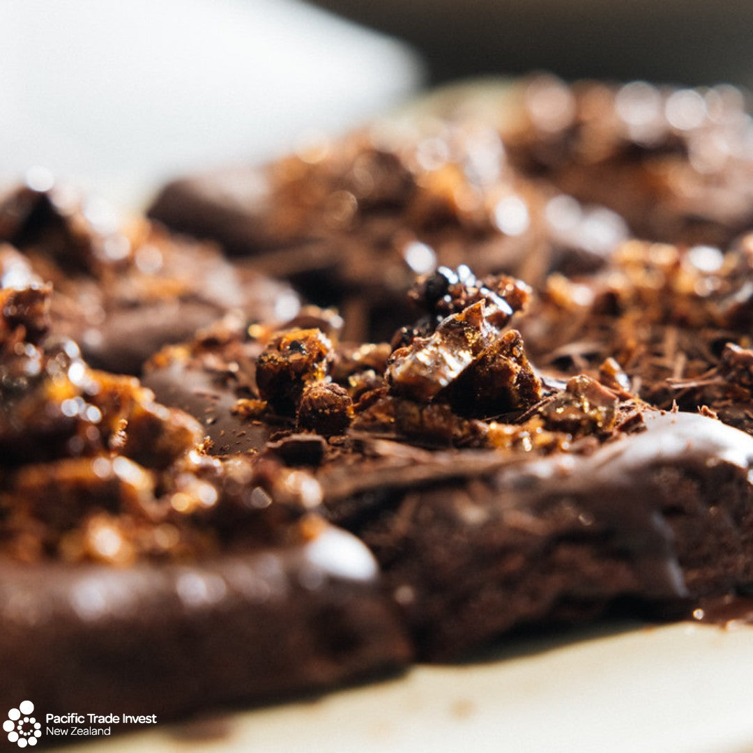 A chocolate dessert made with Aunty Tommy's Koko Samoa, plated by a chef at the Kai Pasifika showcase.