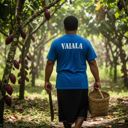 Man walking through a cacao tree plantation with &